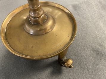 A Flemish or Dutch bronze candlestick, 14/15th C.