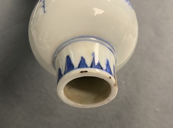 A Chinese blue and white bottle vase with floral design, Transitional period