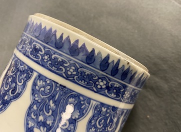 A pair of Chinese blue and white vases with floral designs, Kangxi