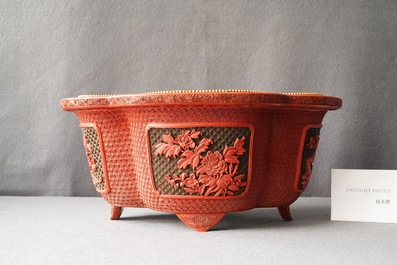 A Chinese quatrefoil jardini&egrave;re in red and black lacquer, Qianlong