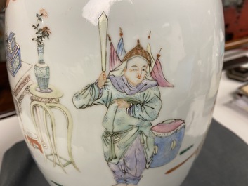 A Chinese famille rose vase with a tattoo scene from 'Jing Zhang Bao Guo', Qianlong mark, 19/20th C.