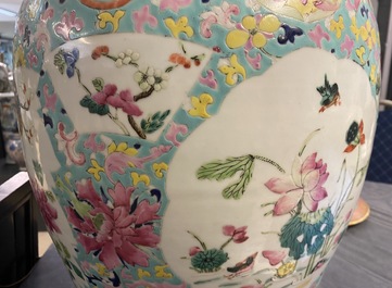 A Chinese famille rose covered vase and a vase with birds and peaches, 19/20th C.