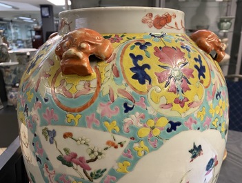 A Chinese famille rose covered vase and a vase with birds and peaches, 19/20th C.