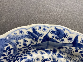 A Chinese blue and white lobed dish with fish, Kangxi