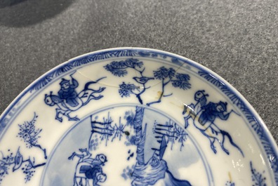 Six Chinese blue and white cups and saucers with horseriders, Kangxi