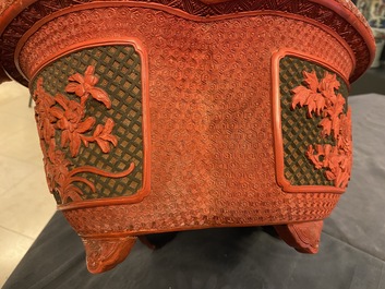 A Chinese quatrefoil jardini&egrave;re in red and black lacquer, Qianlong