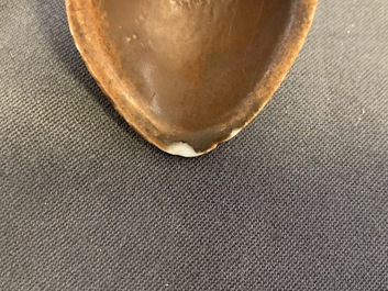 22 Chinese brown- and white-glazed spoons, 17/18th C.