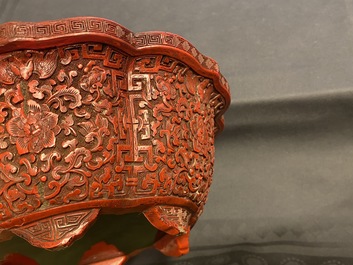 A Chinese carved cinnabar lacquer jardini&egrave;re, Yongzheng/Qianlong