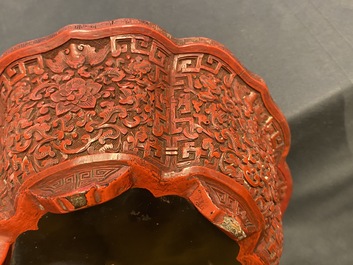 A Chinese carved cinnabar lacquer jardini&egrave;re, Yongzheng/Qianlong