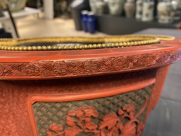 A Chinese quatrefoil jardini&egrave;re in red and black lacquer, Qianlong