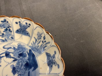 Six Chinese blue and white lobed plates with ducks and butterflies, Kangxi