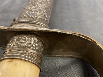 A Chinese silver, tie li mu wood and bone sword, 19th C.