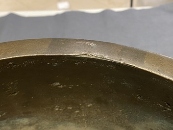 A large Chinese bronze tripod censer, 18/19th C.