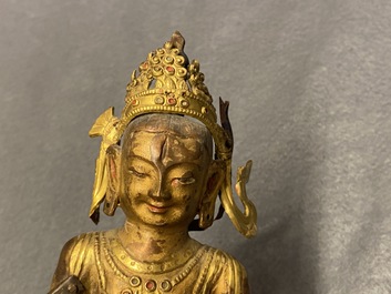 A Sino-Tibetan gilt copper alloy figure of Buddha, 18/19th C.