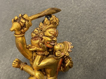 Two Sino-Tibetan gilt bronze figures, 19th C.