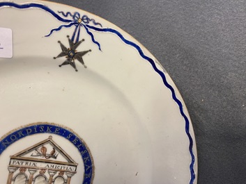 A Chinese export 'Nordic Society' plate dated 1785 and one inscribed 'Dus Leydons Vriendschap', Qianlong