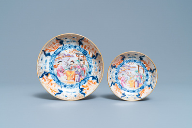Une coupe, une tasse et une soucoupe en porcelaine de Chine famille rose &agrave; d&eacute;cor mandarin, Qianlong