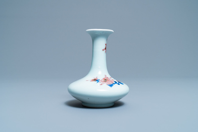 A small Chinese blue, white and underglaze red bottle vase with floral design, Republic