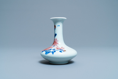 A small Chinese blue, white and underglaze red bottle vase with floral design, Republic