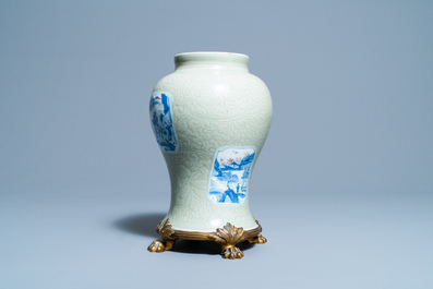 A Chinese incised celadon-glazed vase with blue, white and copper red panels, Kangxi