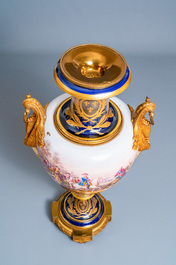 A pair of massive French S&egrave;vres-style vases with gilt bronze mounts, signed Desprez, 19th C.