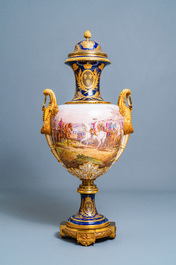 Une paire de tr&egrave;s grands vases en porcelaine dans le style de S&egrave;vres aux montures en bronze dor&eacute;, sign&eacute;s Desprez, France, 19&egrave;me