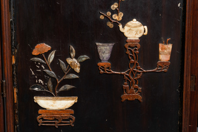 A Chinese lacquered wooden screen embellished with bone, wood and various stones, 18/19th C.