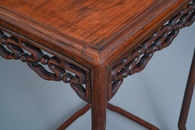 Three Chinese wooden nesting side tables, 19th C.