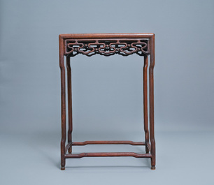 Three Chinese wooden nesting side tables, 19th C.