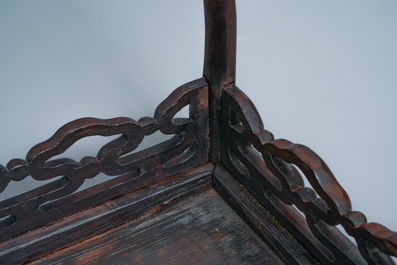 Three Chinese wooden nesting side tables, 19th C.