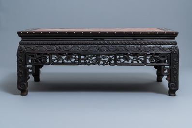 A Chinese mother-of-pearl-inlaid wooden low side table with marble top, 19th C.