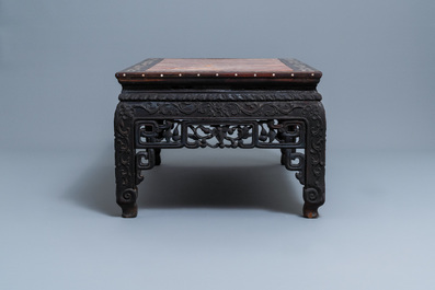 A Chinese mother-of-pearl-inlaid wooden low side table with marble top, 19th C.