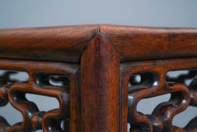 Three Chinese wooden nesting side tables, 19th C.