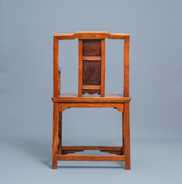 A Chinese wooden chair with inserted carved panels, 19th C.