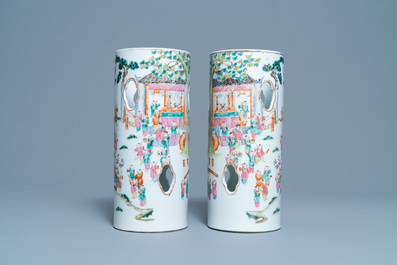 A pair of reticulated Chinese famille rose '100 boys' hat stands, Qianlong mark, 19th C.