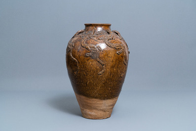 A large Chinese brown-glazed relief-molded martaban jar with dragons, Qing