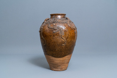 A large Chinese brown-glazed relief-molded martaban jar with dragons, Qing