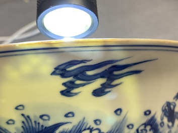 A Chinese blue and white 'dragon and carps' bowl, Xuande mark, Kangxi