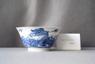 A Chinese blue and white 'dragon and carps' bowl, Xuande mark, Kangxi