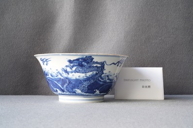 A Chinese blue and white 'dragon and carps' bowl, Xuande mark, Kangxi