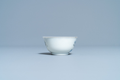 A Chinese blue and white cup and saucer with a design after Cornelis Pronk, Yongzheng/Qianlong