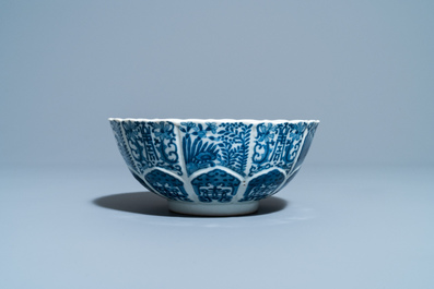 A Chinese blue and white lotus-molded bowl, Jiajing mark, 19th C.