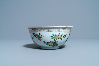 A Chinese famille verte bowl with flowers and fruits, Kangxi