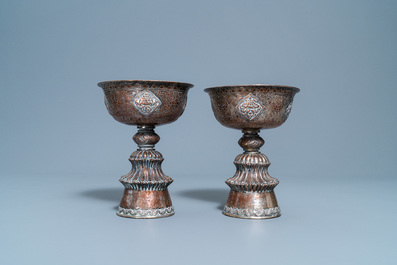 A pair of Tibetan silvered copper alloy altar bowls, 19/20th C.