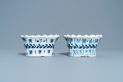 A pair of blue and white French faience bouqueti&egrave;res or wall flower holders, Lille, 18th C.