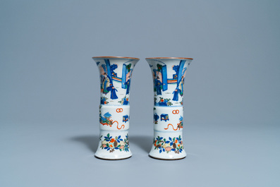 A pair of Chinese wucai 'gu' vases, 19th C.