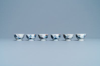 Four Chinese Imari-style plates, a large teapot and six cups and saucers, Kangxi/Qianlong