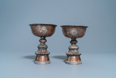 A pair of Tibetan silvered copper alloy altar bowls, 19/20th C.