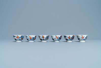 Four Chinese Imari-style plates, a large teapot and six cups and saucers, Kangxi/Qianlong