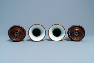 A pair of Chinese wucai 'gu' vases, 19th C.